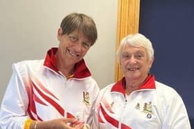 Caroline Halliwell (Royal Leamington Spa BC) receives her County Colt badge from Immediate Past President, Caroline Harris (Nuneaton BC)