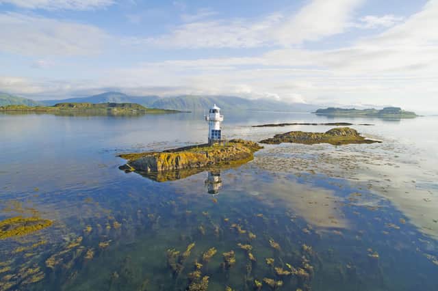 The view across Loch Linnhe to the Morvern Mountains with the Sgeir Bhuidhe Lighthouse in the foreground