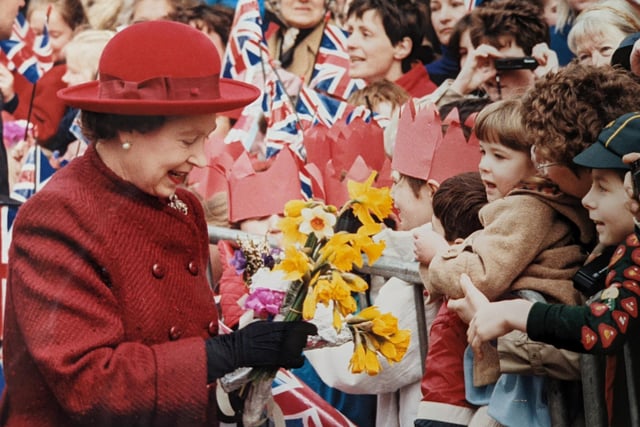 The Queen during her visit to officially open the Royal Priors Shopping Centre in Leamington in 1988. She also unveiled a plaque at the town hall to commemorate the 150th anniversary of Queen Victoria's granting of the royal warrant to Leamington.
