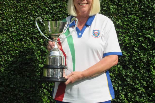 New 2-Wood Singles Champion, Dawn Horne, with her trophy.