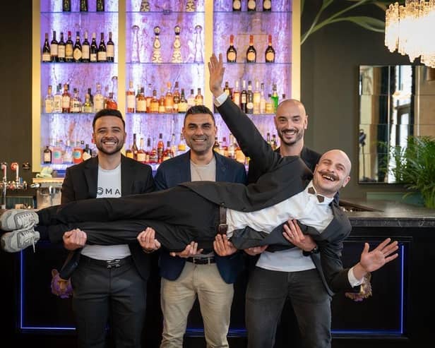 The Nomad team: Hares, Ammiras and Romain carrying Beka the bar's 'Head of Mixology' and Bar Manager. Credit: PHOTOZY LTD