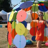 Julia Snowdin with one of her dot dome art installations. Picture supplied.