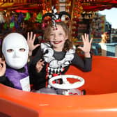 Fairground rides...Harriet and Maggie Eccles. Picture by Andrew Carpenter