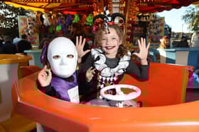 Fairground rides...Harriet and Maggie Eccles. Picture by Andrew Carpenter