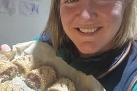 Milly with her sausage rolls.