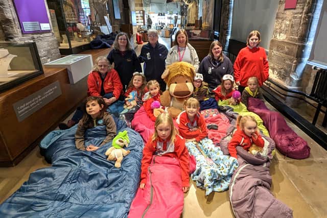 From left - Moira Allen-Donald, Gill Eyers-Hunt, Julie Brown, Rachel Ollerenshaw, Sophie Glennon-Brown and Eva Brown with members of the Rainbows. Photo supplied