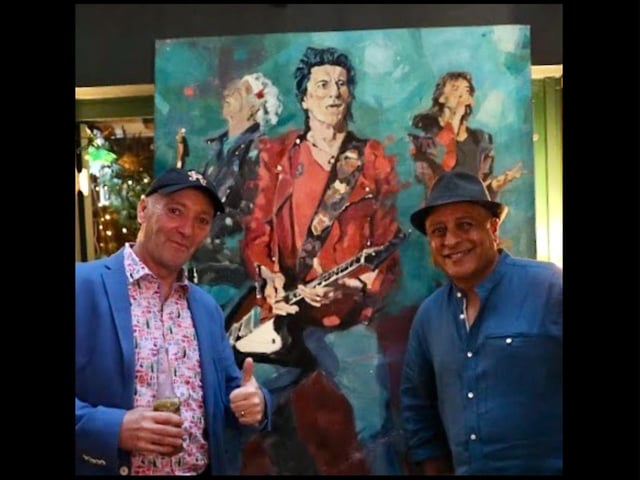 The exhibit featuring work by Rupam Barthakur at Ronnie's Bar. Photo by Alex Harvey of RiVR