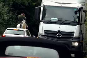 Members of the Warwickshire Hunt were filmed in October causing traffic disruption on a high crash risk section of the busy Fosse Way in Warwickshire. This rider was on his phone as traffic queued behind him.