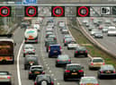 Motorists drive on the hard shoulder of one of the busiest stretches of motorway in Britain between junctions 3 and 7 of the M42