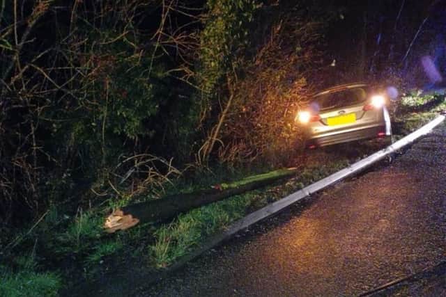 A suspect drink driver has been arrested after he drove into a telegraph pole near Leamington - causing part of the pole to land on another car.