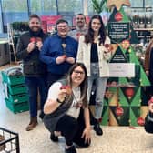 Alex Pearson with more of the team from Morrisons along with Susan and LWS Night Shelter volunteers. Photo supplied