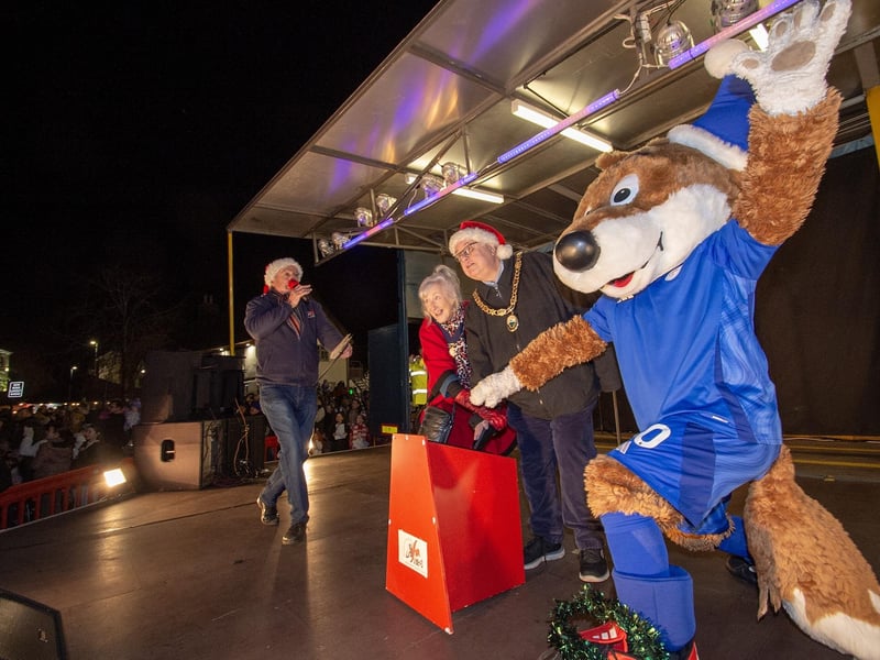 Lutterworth Christmas light switch-on from left, Barry Badger of HFM Radio., consort Valerie Ridley, Lutterworth Mayor Rob Coleman and Filbert Fox.