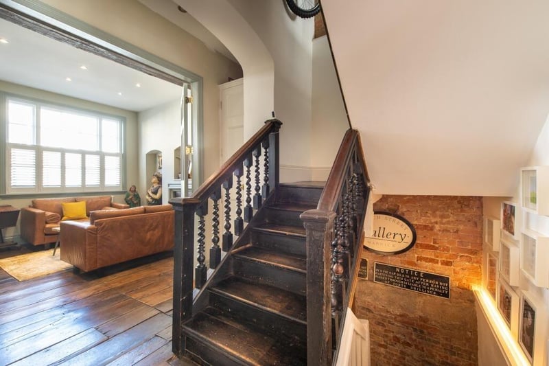 Stairs to the lower ground floor and the first floor.
