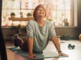 Working out at home can save both time and money (photo: Adobe)
