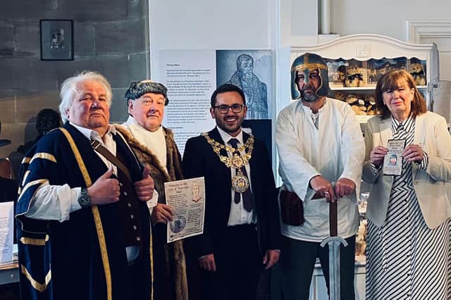 Left to right: Tom Douglas, Chris Willsmore, both Guy of Warwick Society; Mayor of Warwick Cllr Richard Edgington; Peter Knell, Guy of Warwick Society and Liz Healy, manager of Warwick Visitor Centre. Photo supplied