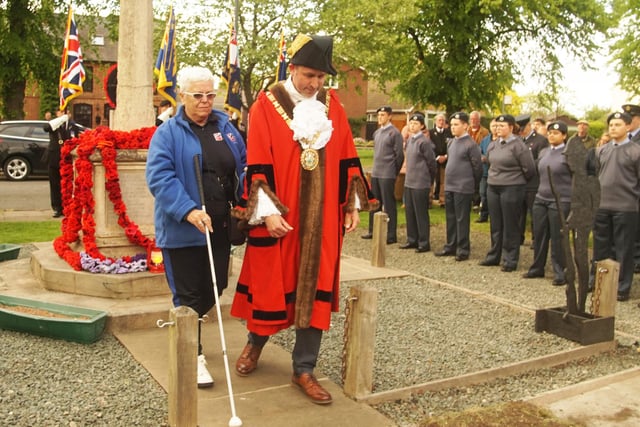 Anne Carpenter, accompanied by the mayor who had placed the 'lamp of peace'.