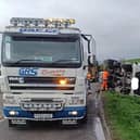 Traffic delays are continuing in south Warwickshire after a lorry fell into a ditch