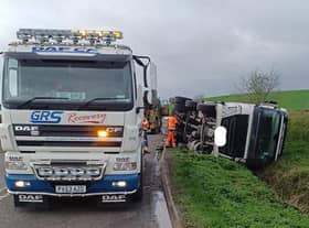 Traffic delays are continuing in south Warwickshire after a lorry fell into a ditch