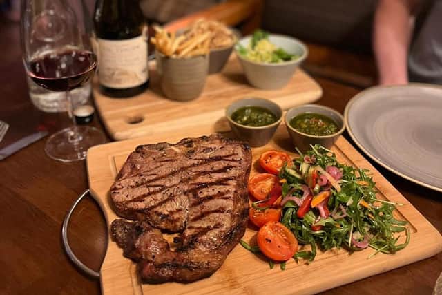 The sharing T-bone steak with sides at The Bell Inn at Ladbroke.