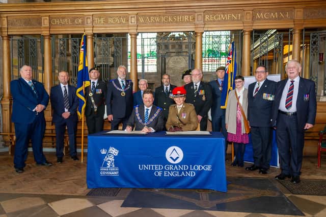 Warwickshire Freemasons recently signed the Armed Forces Covenant. Philip Hall, Provincial Grandmaster and Lt. Col Samantha Brettell from HQ West Midlands, who signed on behalf of the MoD in the Regimental Chapel of the Royal Warwickshire Regiment in the Collegiate Church of St Mary in Warwick. Photo by Mike Baker