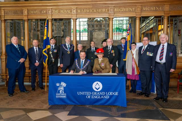 Warwickshire Freemasons recently signed the Armed Forces Covenant.  Philip Hall, Provincial Grandmaster and Lt. Col Samantha Brettell from HQ West Midlands, who signed on behalf of the MoD in the Regimental Chapel of the Royal Warwickshire Regiment in the Collegiate Church of St Mary in Warwick. Photo by Mike Baker