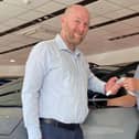 Ian Thomas, business manager of Startin Kia Warwick, hands over the keys to competition winner Richard Oldershaw. Picture supplied.