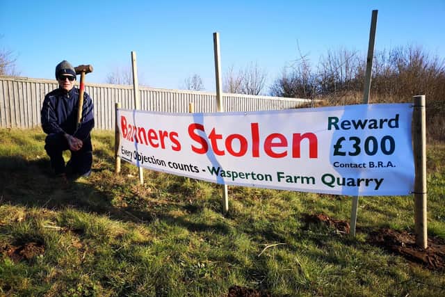 The Barford Quarry campaign group has put up new banners to appeal for the return of the previous ones, which were stolen.