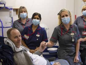 Nigel Fenwick with Myton Hospices Staff at the Warwick hospice. Picture supplied.