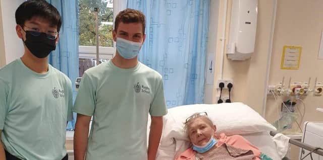 Volunteers help brighten the lives of patients at St Cross.