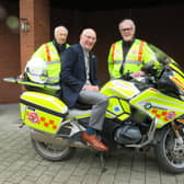 Left to right: Alan Brickwood, Warwick Rotary President Keith Talbot on WSBB’s BMW 1250RT bike and Martin Williams. Photo supplied