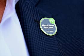 Lioncourt Homes staff member wearing their Mental Health First Aider badge.