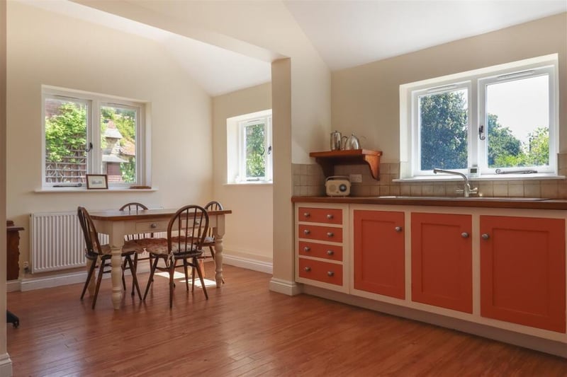 The kitchen leading to the dining area.