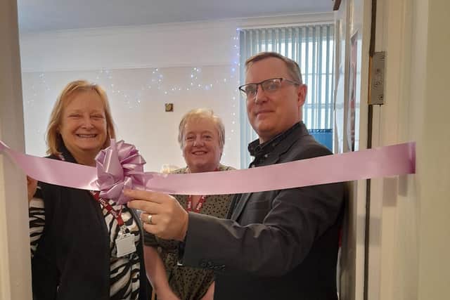 Carin Jackson, retiring Chair of Trustees, Sarah Gall, Centre Manager and Simon Terry, Rugby branch manager of the Hinckley & Rugby Building Society formally opening the newly-refurbished lounge at the Percival Guildhouse.