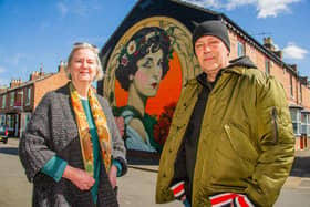 The Lady of Shrubland Street mural has been created on a gable end wall of a house in Shrubland Street.Pictured: Tim Robotham, the designer, and Dianne Page of Art Friends Warwickshire.Credit: Mike Baker