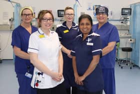 Hospital staff celebrate the recognition.