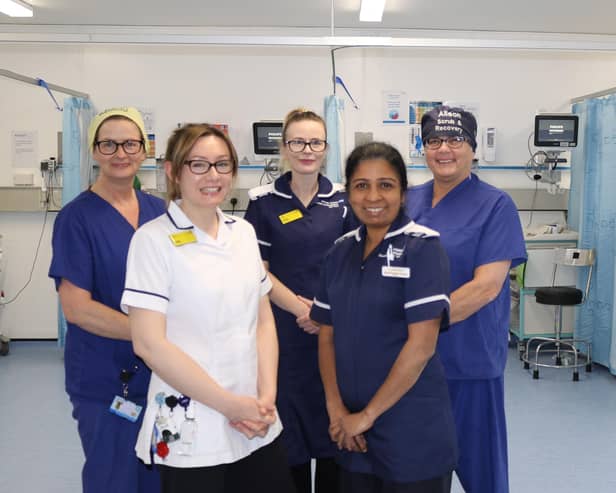 Hospital staff celebrate the recognition.