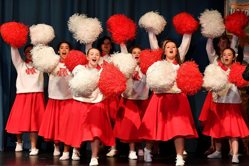 Cheerleaders on the stage of Rugby Theatre.