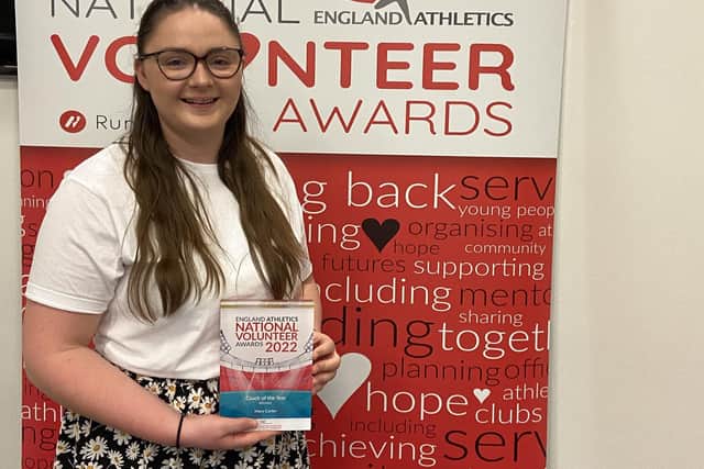 Junior head coach Mary Carter of Leamington Cycling and Athletics Club (C&AC) with her National Volunteer Award from England Athletics. Picture supplied.