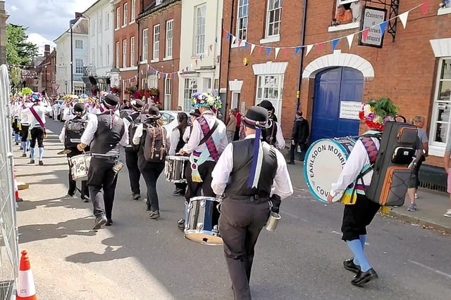 The Warwick Folk Festival Morris Dancers procession heading down Church Street. Photo by Geoff Ousbey