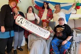 Brandon House residents and colleagues dressed in traditional Scottish clothing