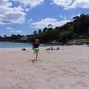 Tom playing on the beach in Brittany.