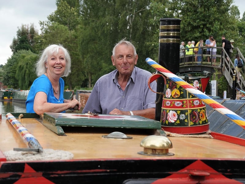 Lady Sheila Suchet pictured steering the Raymond, assisted by Roger Golder of the Friends of Raymond, in the opening parade of the 2023 Rally.