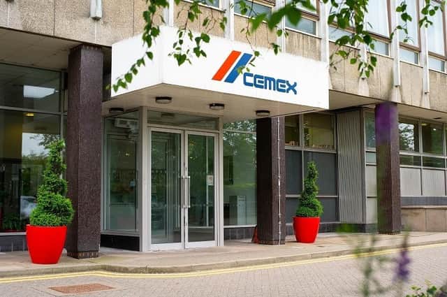 Happier times... though the sign still sits above the entrance to the now-empty offices, Cemex has shared this photo of when it was in good order and ready to welcome visitors to head office.