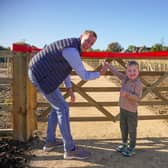Gareth and his son cut the ribbon.
