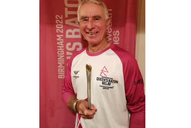 Les Barnett with the replica baton he received for running pat of the Stratford leg of the Queen's Baton Relay for the Birmingham 2022 Commonwealth Games. Picture supplied.
