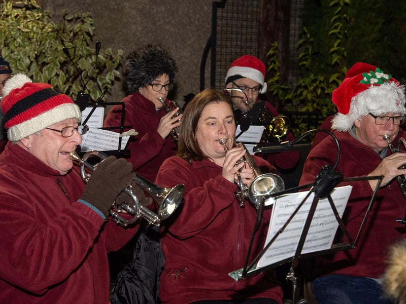 Lutterworth Town Band entertain late-night shoppers.
