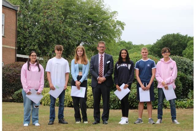GCSE pupils with Headmaster, Mr Hester at Princethorpe College this morning. Left to right Dina Parmenter, Zak Johnson, Daisy Southgate, Simran Sandhar, Harry Kelly and Joe Newborough. Photo supplied by Princethorpe College