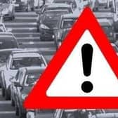 The road is closed this afternoon (December 14).
