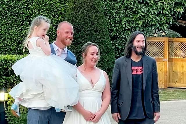 Keanu Reeves gatecrashed a couple's wedding in Northamptonshire.