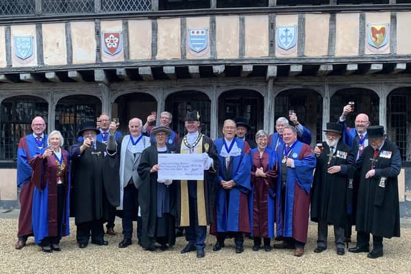 The cheque was handed to the Master of the Lord Leycester Hospital, Dr Heidi Meyer, by the Bailiff of Warwick Court Leet, Mark Robertson, and witnessed by representatives of the Brethren of Lord Leycester Hospital and the members of the Court Leet social committee who organised and ran the festival. Photo by Becky Clarke